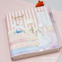 Notes pamiętnik z długopisem króliczek w łóżku